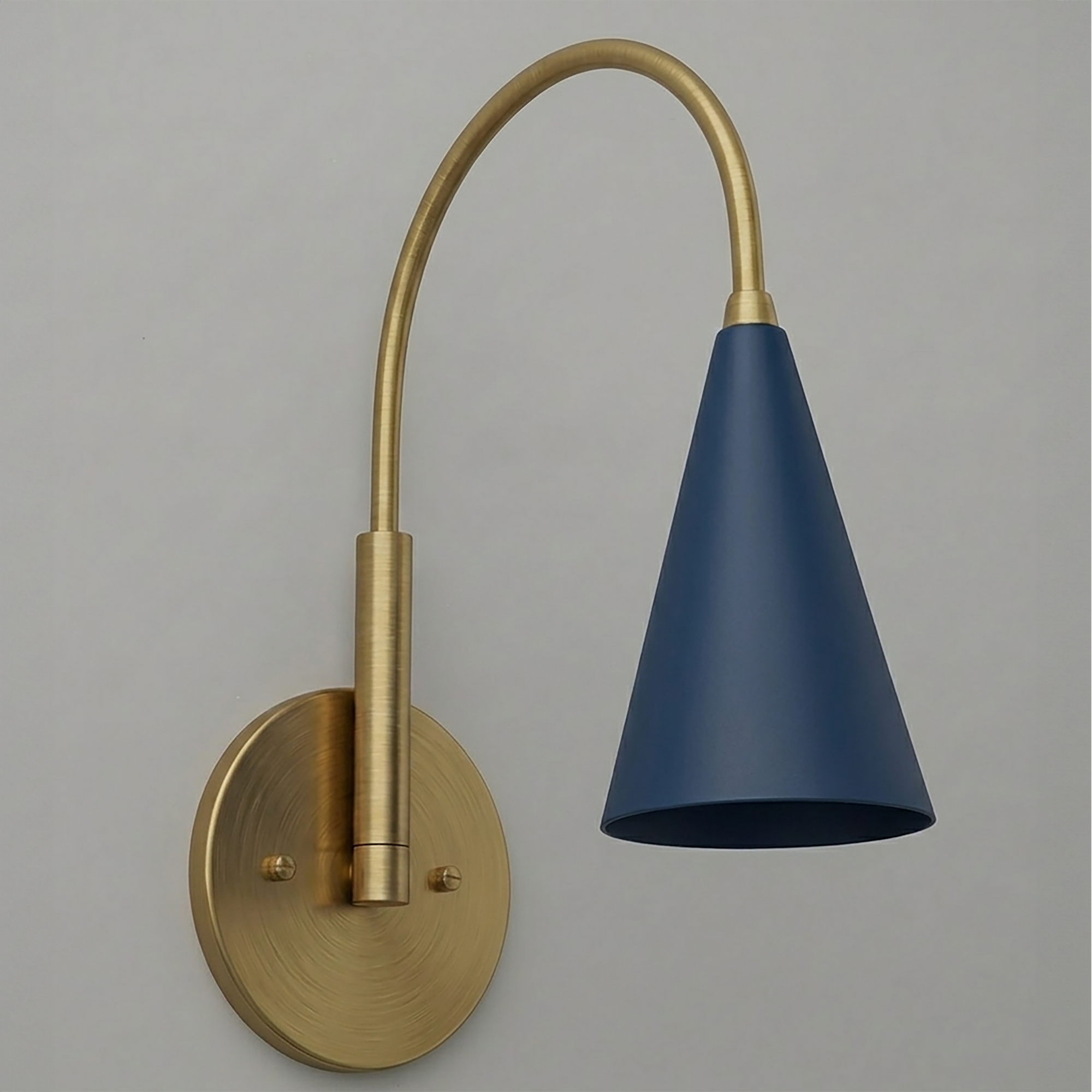 Brushed brass wall sconce with curved arm and navy blue conical metal shade. - SCONCE MODEL NO. 1309