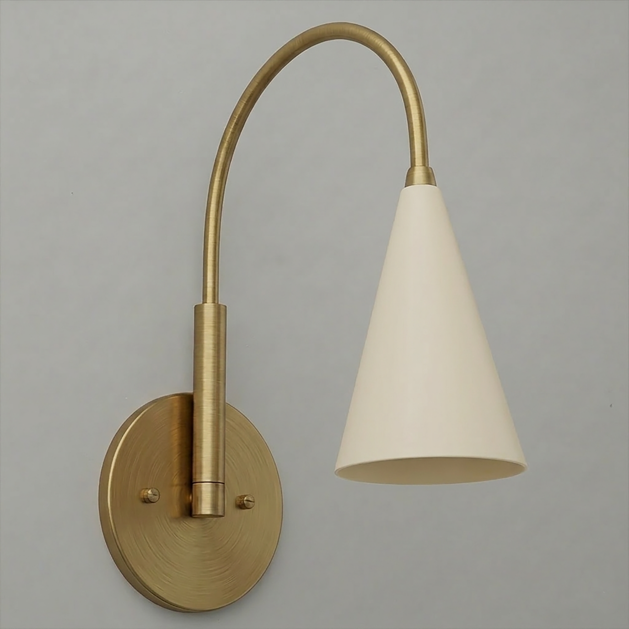 Brushed brass wall sconce with curved arm and white cone-shaped shade. - SCONCE MODEL NO. 1309