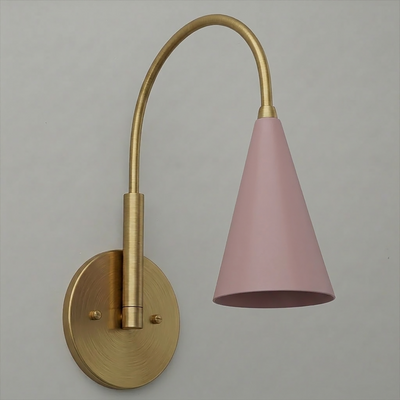 Wall sconce with a curved brass arm and round brass base, featuring a matte pink conical shade. - SCONCE MODEL NO. 1309