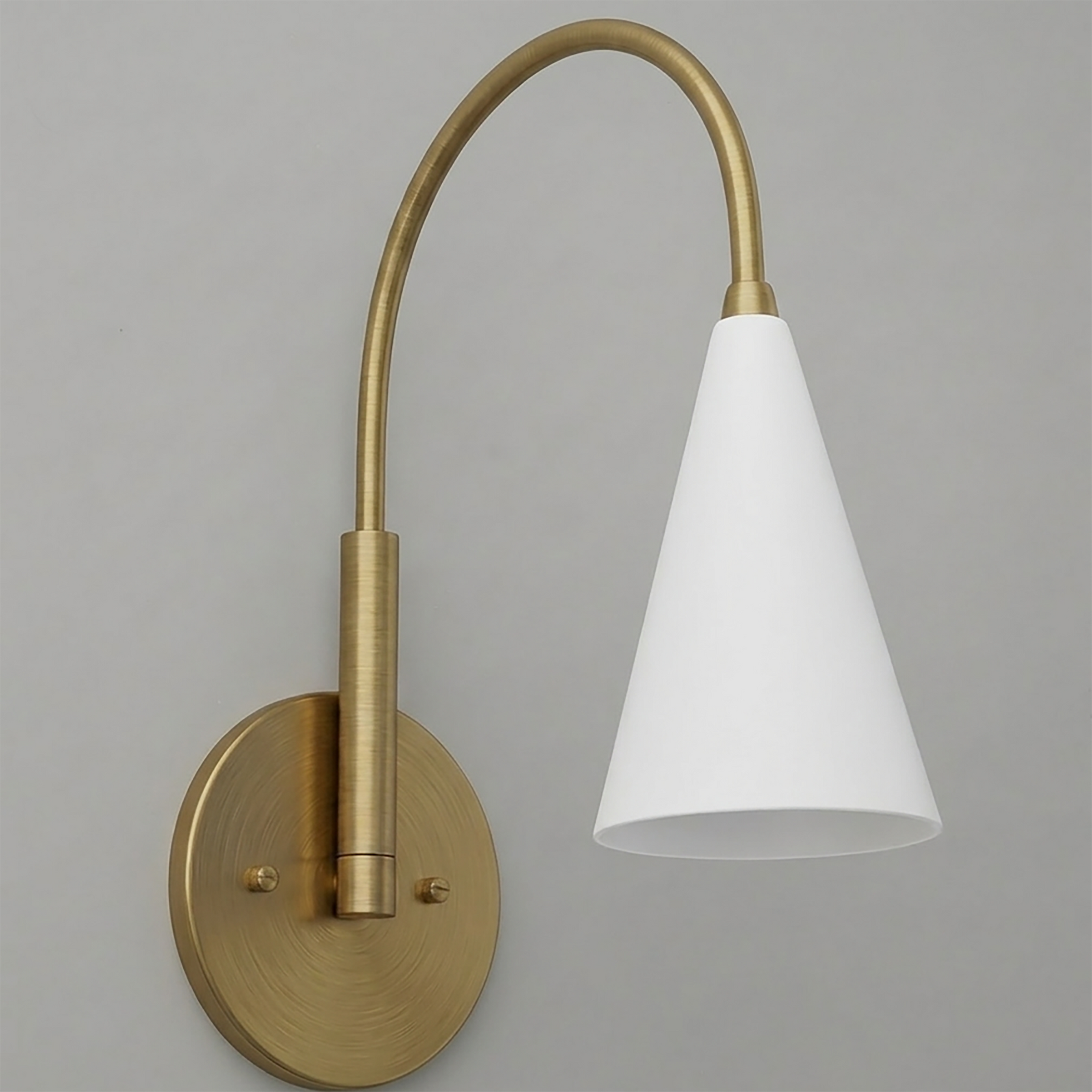 Brushed brass wall sconce with curved arm and white conical metal shade, single bulb design. - SCONCE MODEL NO. 1309