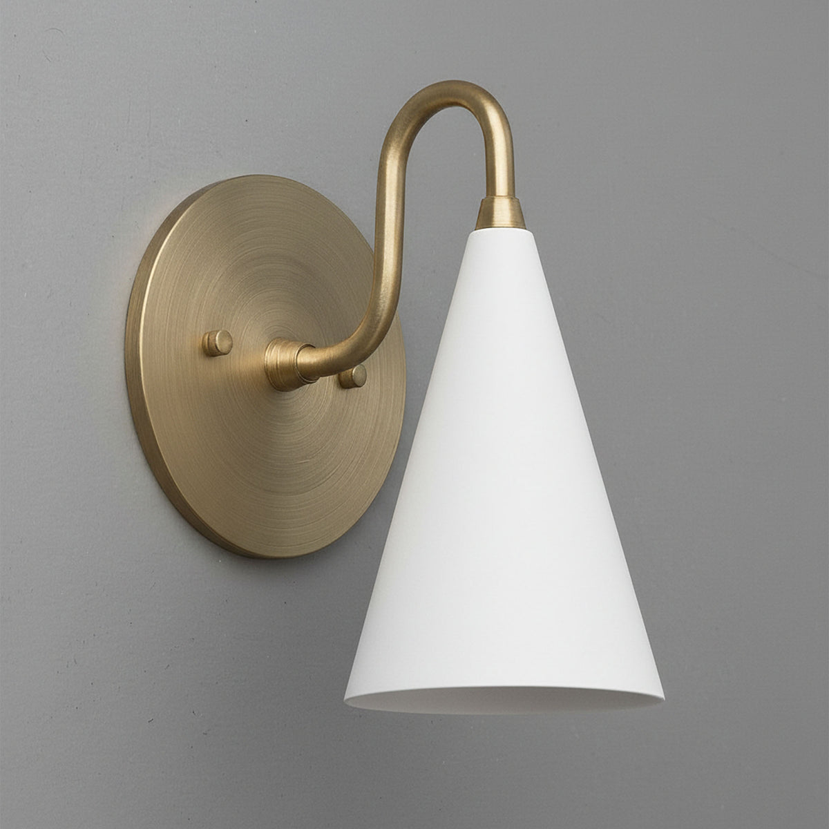 Antique brass wall sconce with white conical shade and round backplate. - Sconce Model No. 2900