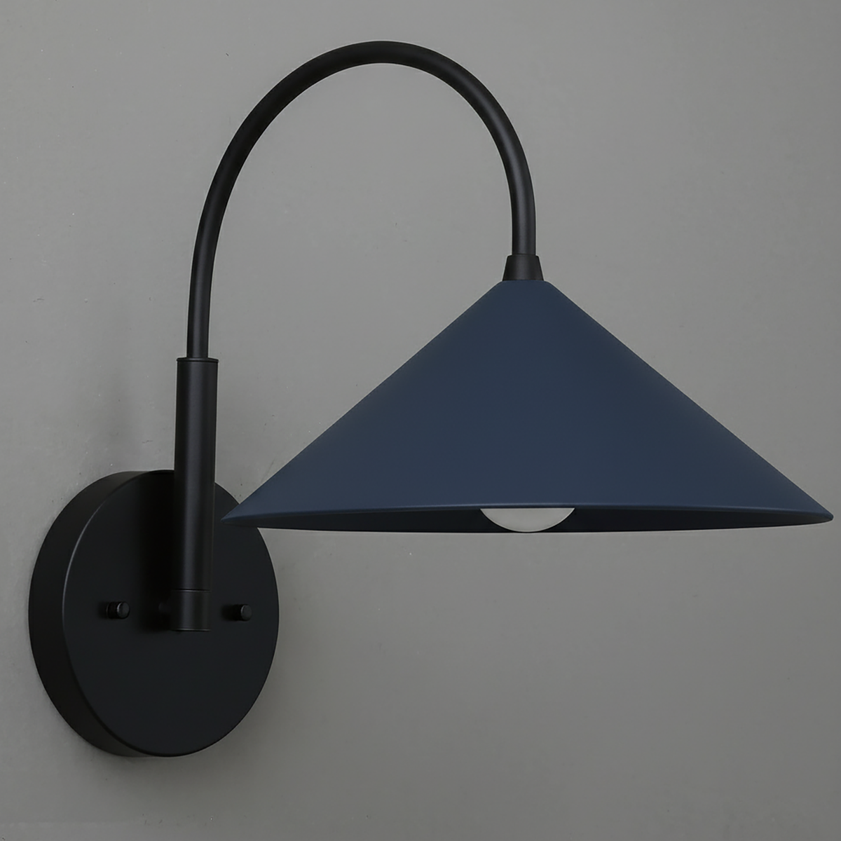 Black metal wall sconce with curved arm and coal blue conical shade. - Sconce Model No. 1583