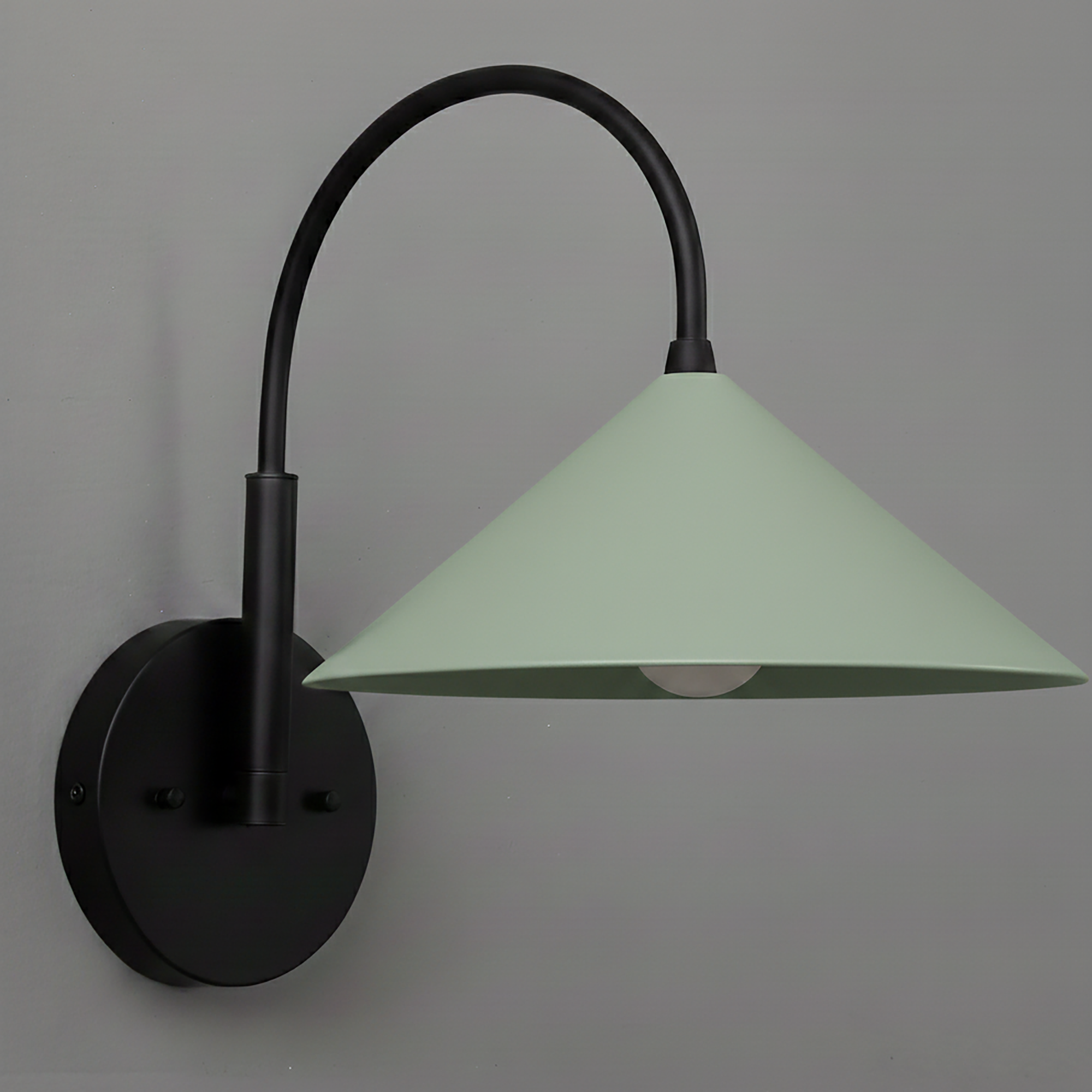 Black metal wall sconce with curved arm and pale green conical shade. - Sconce Model No. 1583