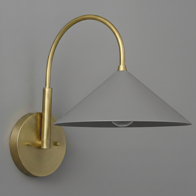 Wall sconce with brass curved arm and matte gray metal cone shade. - Sconce Model No. 1583