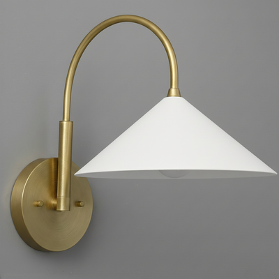 Antique brass sconce with curved arm and wide white conical shade mounted on brass round backplate. - Sconce Model No. 1583