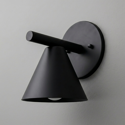 Matte black metal wall sconce with conical shade and cylindrical arm mounted on round backplate. - SCONCE MODEL NO. 5075