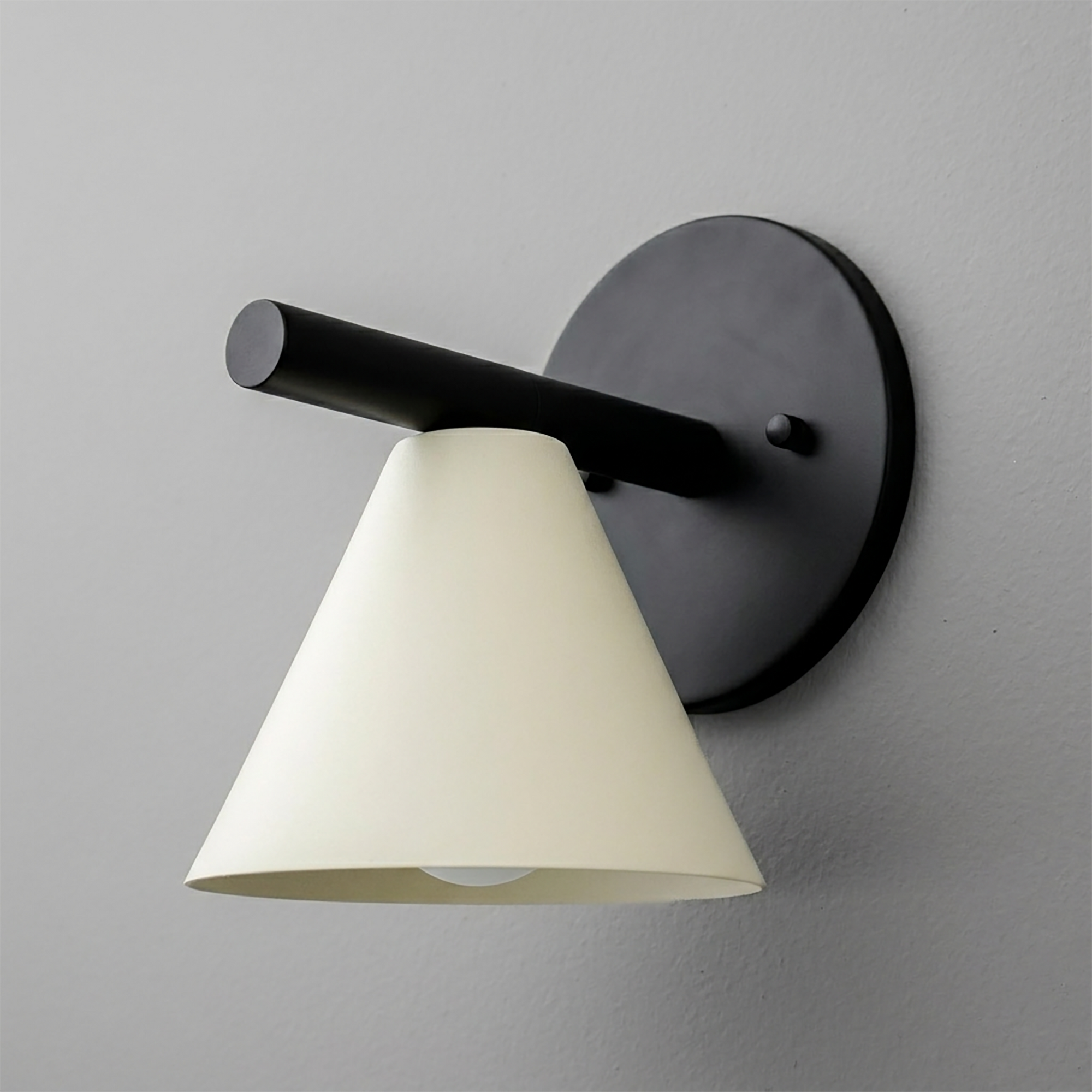 Matte black metal wall sconce with a conical white lampshade and round backplate. - SCONCE MODEL NO. 5075