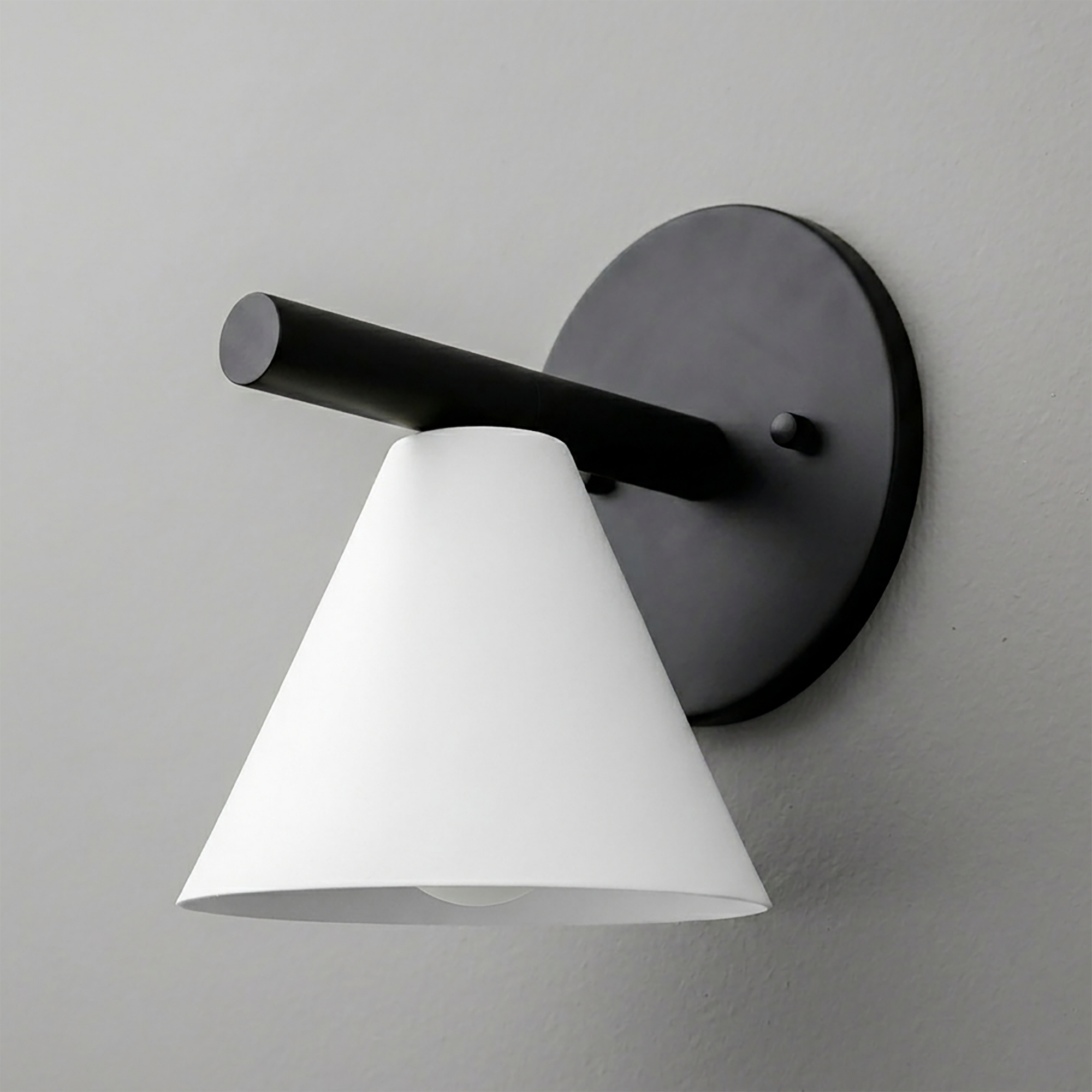 Wall-mounted sconce with matte black round base and horizontal rod, featuring white conical lampshade. - SCONCE MODEL NO. 5075