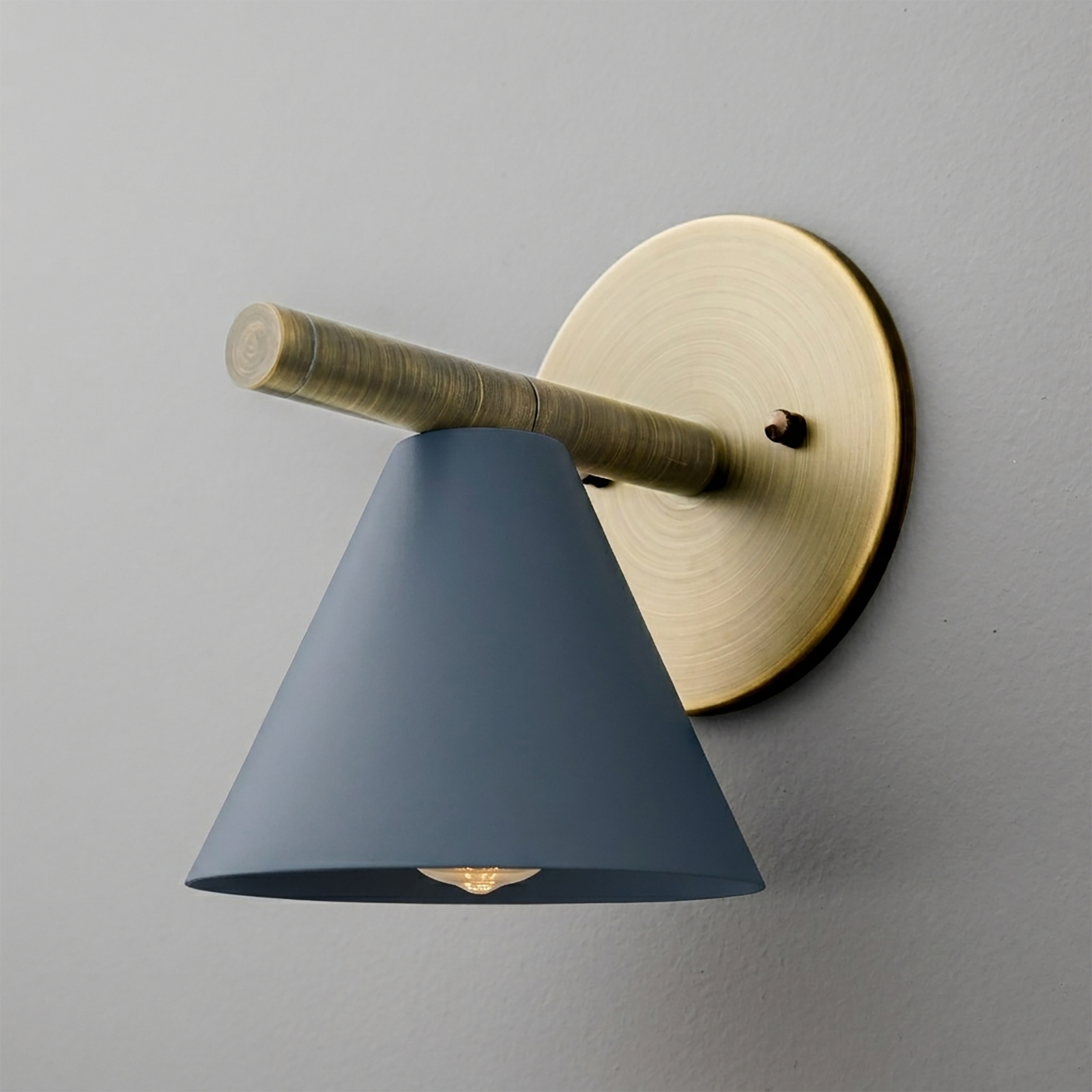 Wall sconce with matte blue conical shade and brushed brass circular mount and arm. - SCONCE MODEL NO. 5075