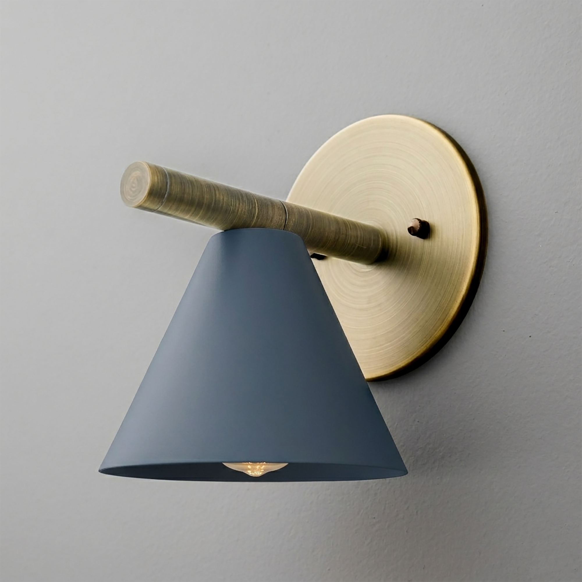 Wall sconce with matte blue conical shade and brushed brass circular mount and arm. - SCONCE MODEL NO. 5075