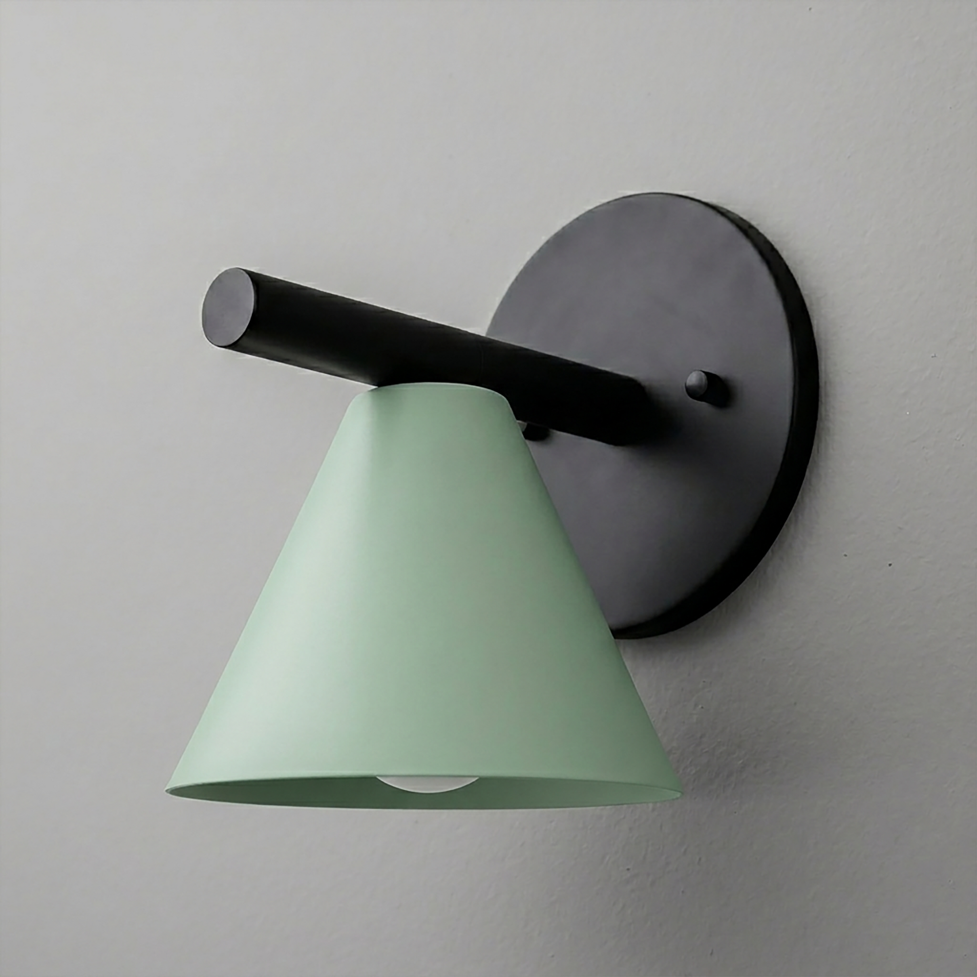 Black metal sconce with horizontal arm and mint green conical shade covering one bulb. - SCONCE MODEL NO. 5075