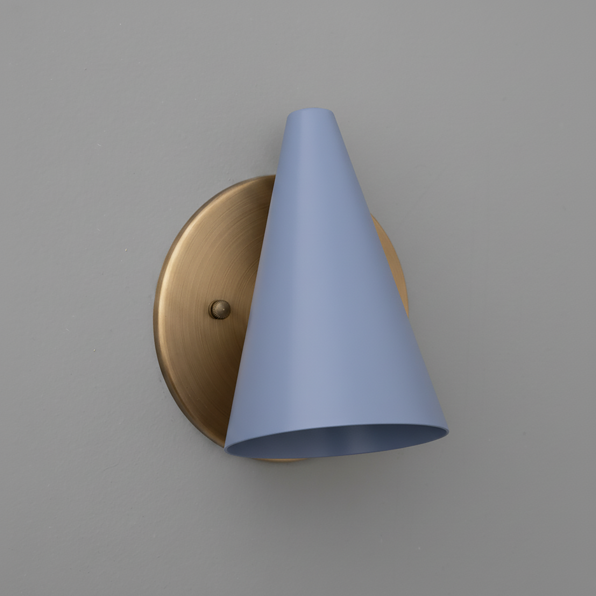 Wall-mounted sconce with a matte brass round base and a conical light blue metal shade. - SCONCE MODEL NO. 5950