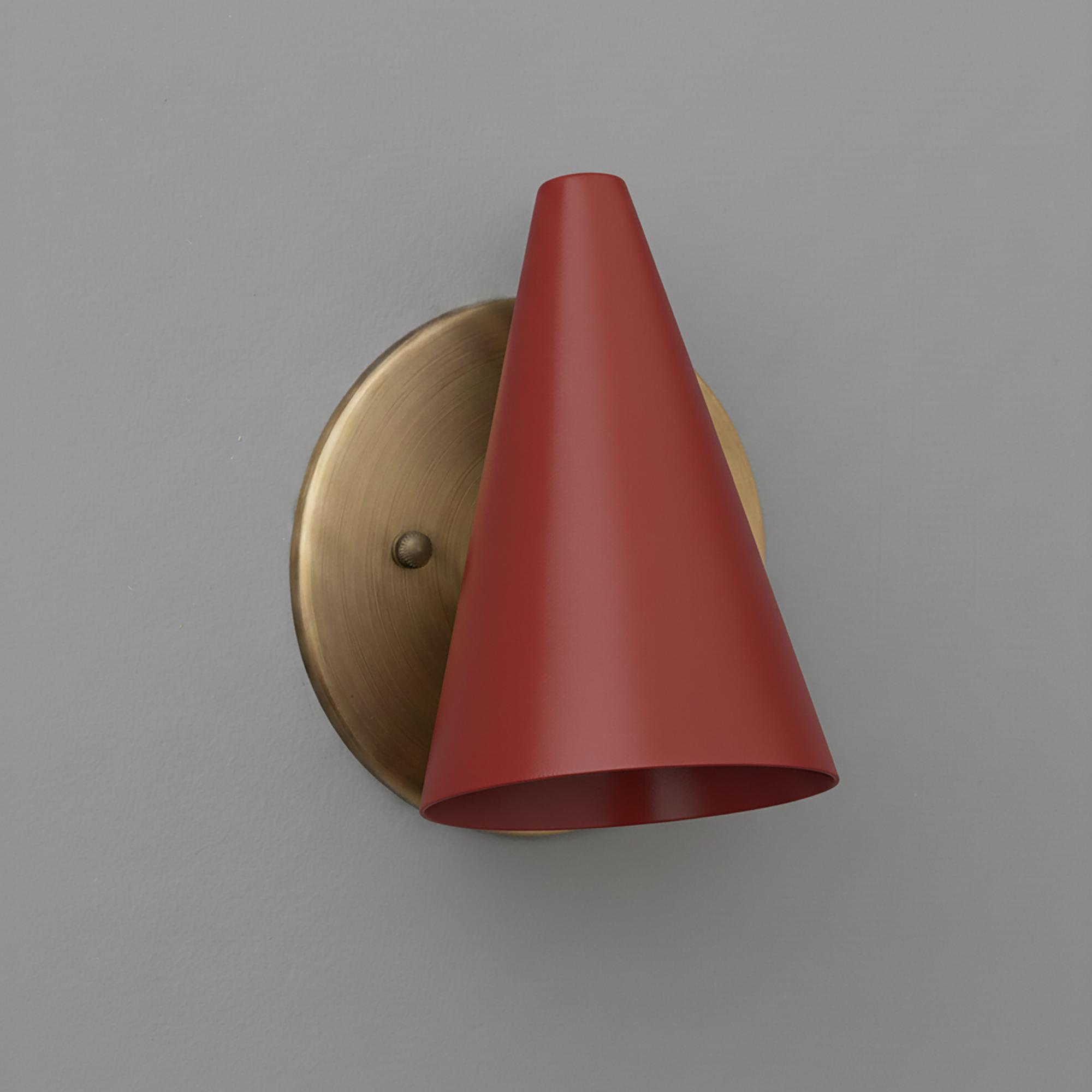 Matte red cone-shaped metal sconce with brushed brass circular backplate and single bulb holder. - SCONCE MODEL NO. 5950
