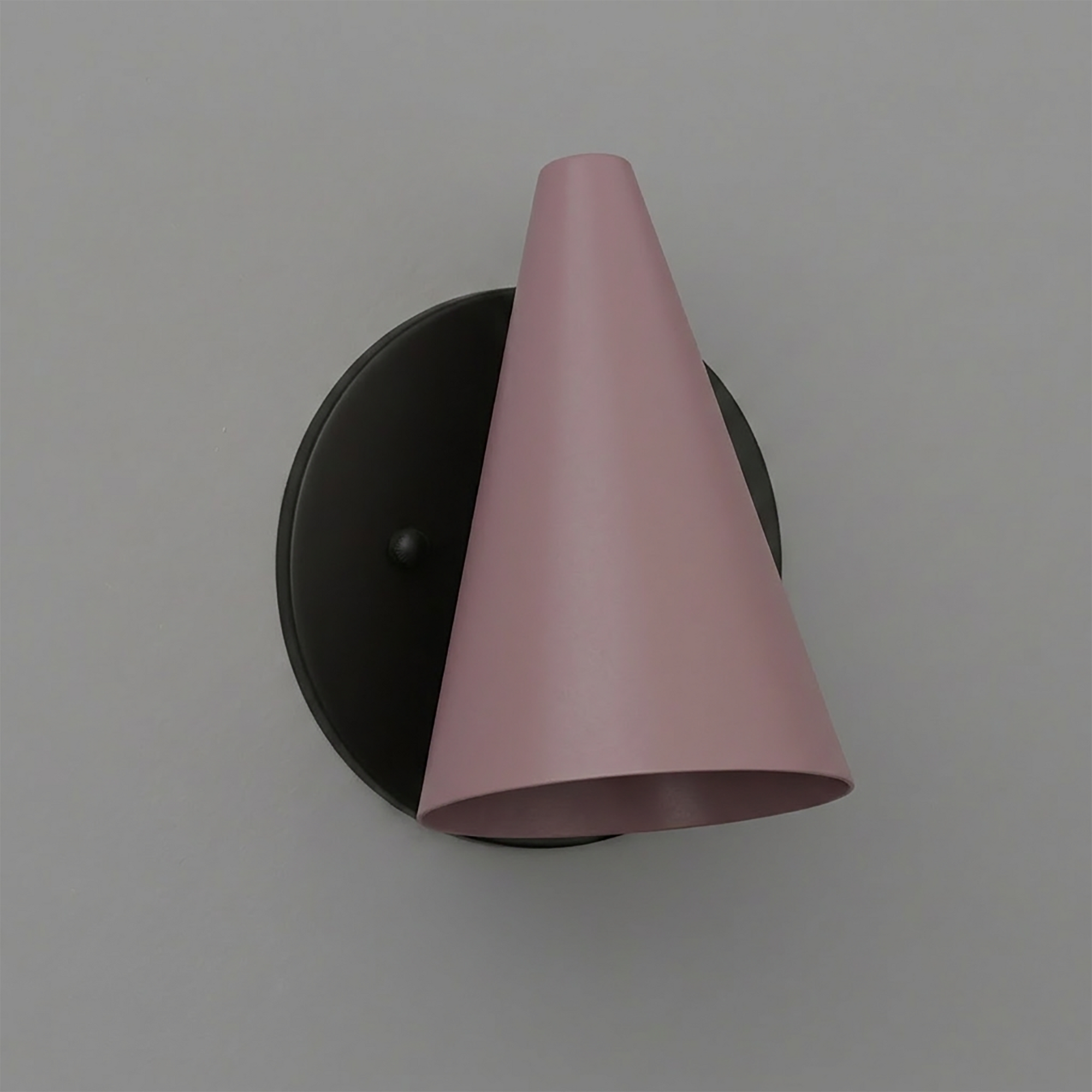 Wall sconce with matte black round base and conical matte pink metal shade. - SCONCE MODEL NO. 5950