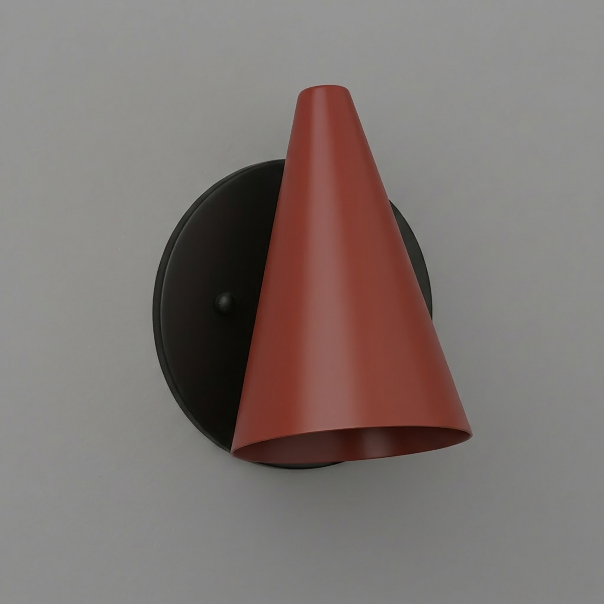 Matte black round wall mount with a large conical matte terracotta shade sconce. - SCONCE MODEL NO. 5950