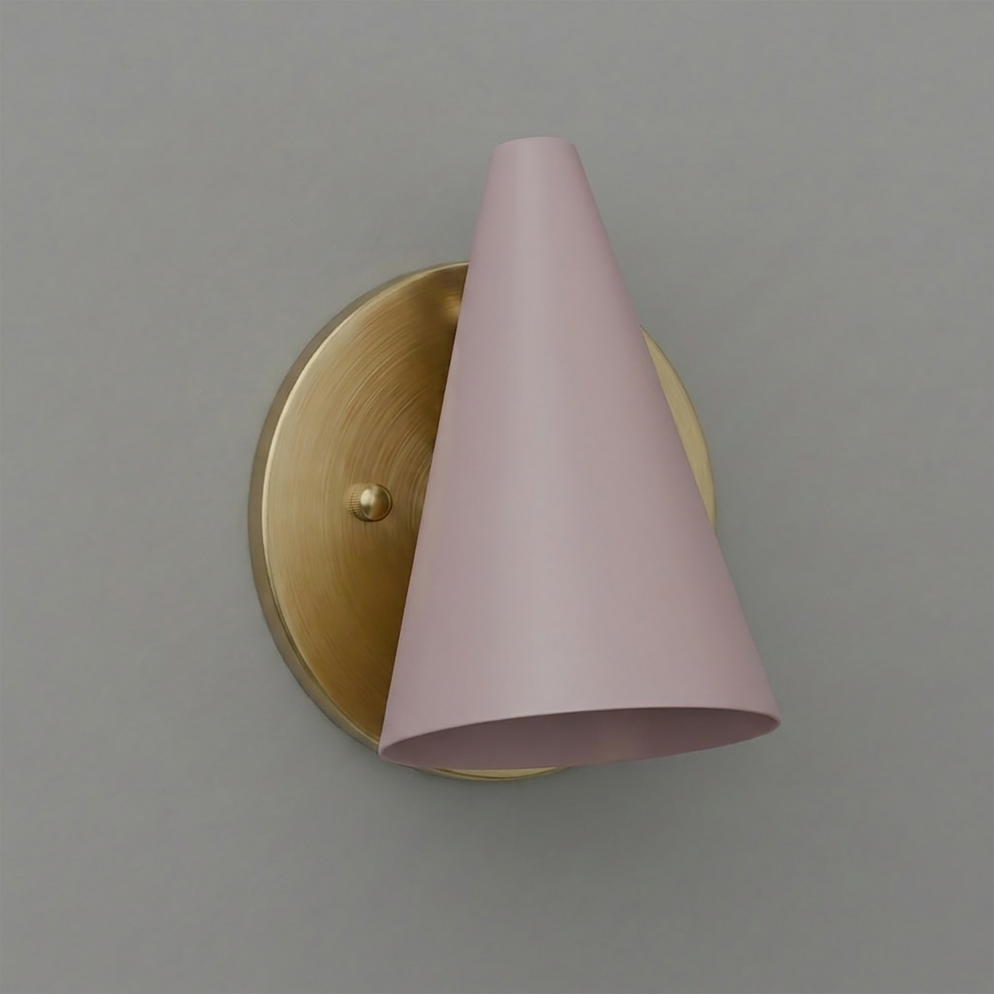Wall-mounted sconce with matte pink conical shade and brushed brass circular base. - SCONCE MODEL NO. 5950