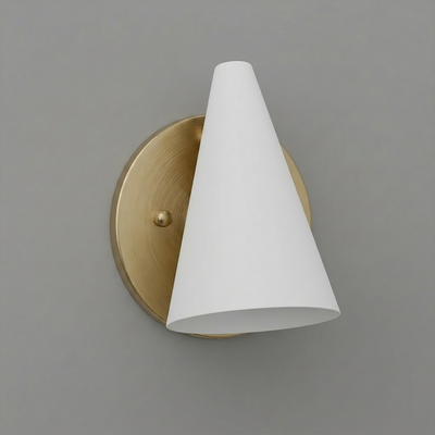 Wall sconce with brushed brass circular base and white conical shade angled downward. - SCONCE MODEL NO. 5950