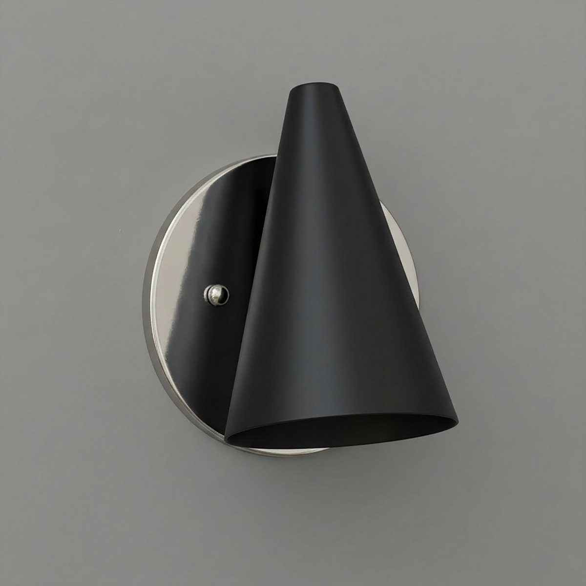 Matte black conical metal wall sconce with round brushed nickel backplate and single bulb fixture. - SCONCE MODEL NO. 5950