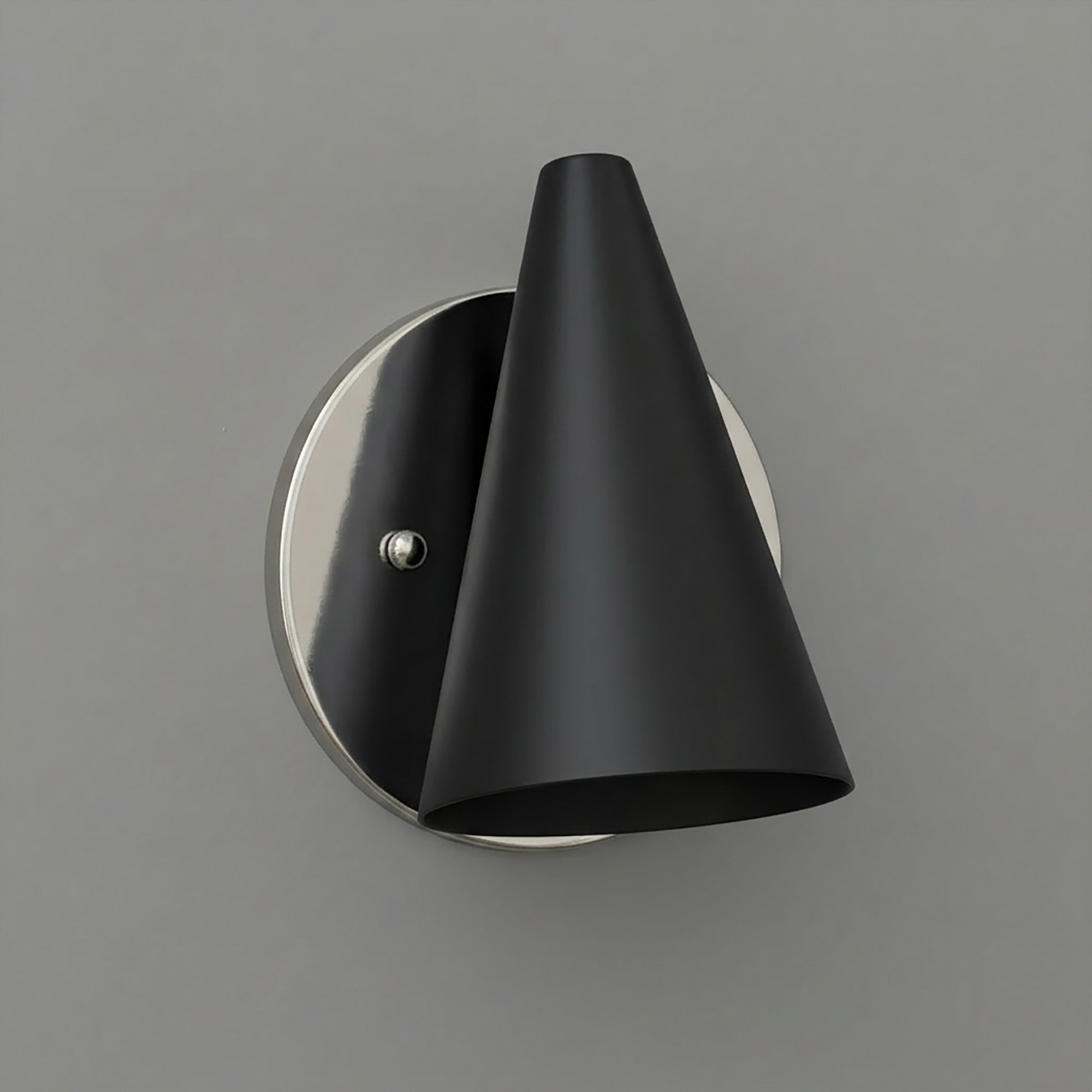 Matte black conical metal wall sconce with round brushed nickel backplate and single bulb fixture. - SCONCE MODEL NO. 5950