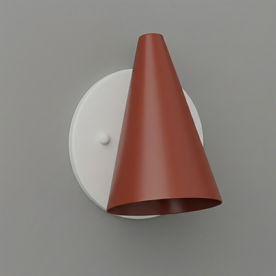Wall sconce with matte white round base and angled terracotta-colored metal cone shade. - SCONCE MODEL NO. 5950