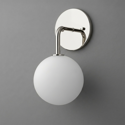 Wall-mounted sconce with polished chrome circular backplate and frosted white glass globe shade. - SCONCE MODEL NO. 7660