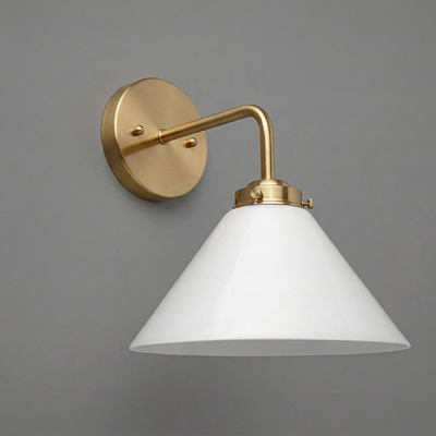 Wall-mounted sconce with brushed brass arm and round base, featuring a white conical glass shade. - SCONCE MODEL NO. 8751