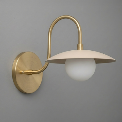 Brushed brass wall sconce with curved arm, flat dome shade, and white globe bulb. - SCONCE MODEL NO. 3799