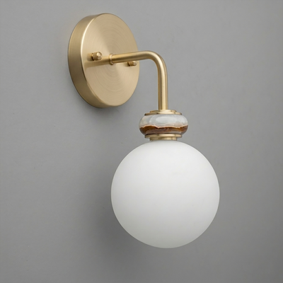 Wall sconce with matte gold metal arm and round white frosted glass globe shade. - SCONCE MODEL NO. 5449