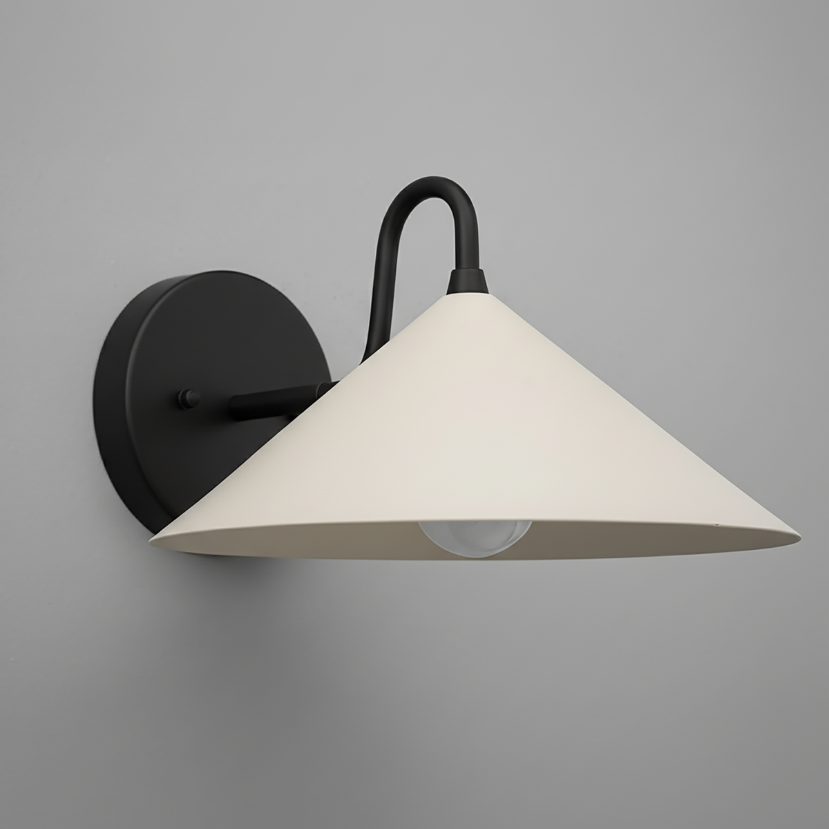 Matte black wall sconce with wide cream conical shade and exposed bulb design. - SCONCE MODEL NO. 6528