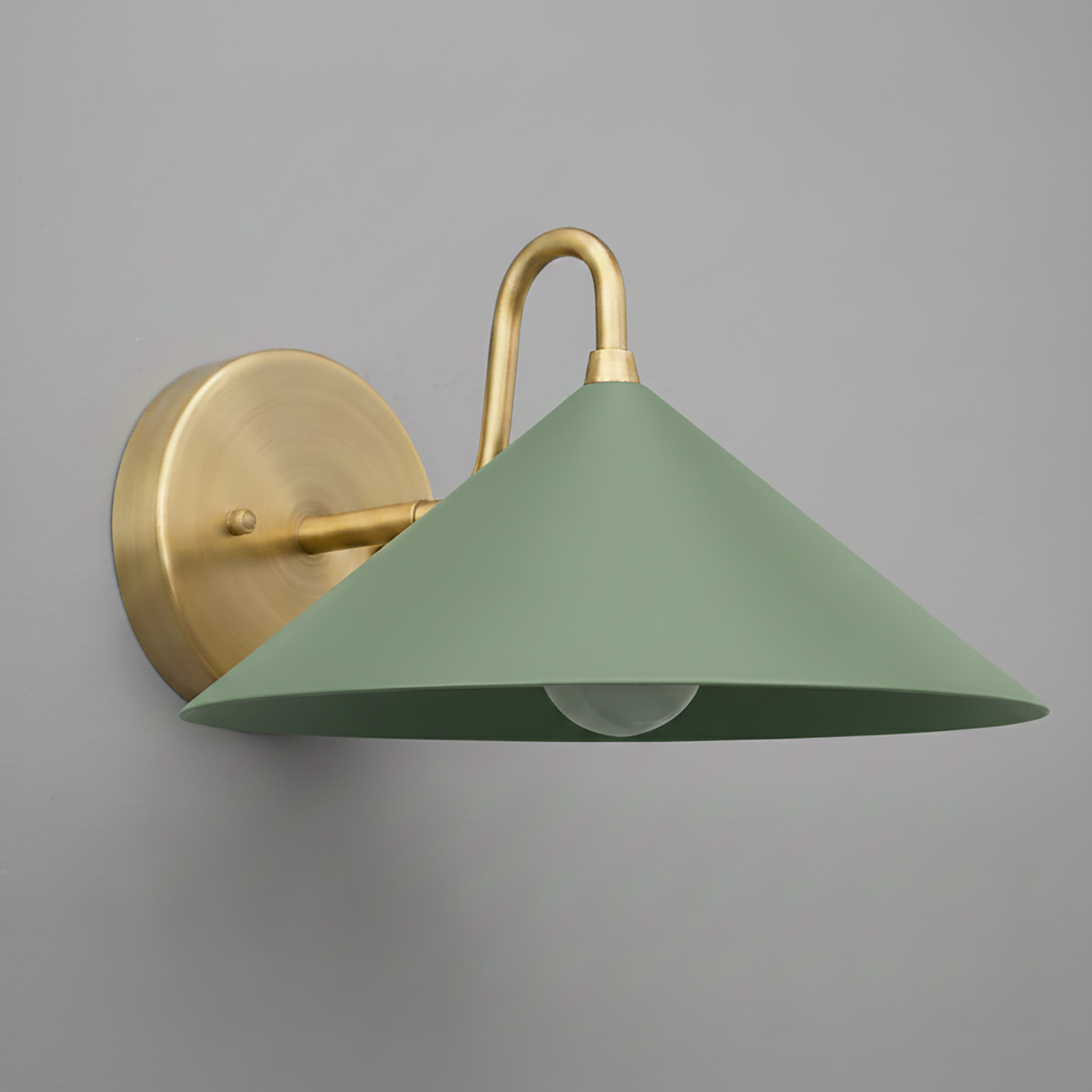 Wall sconce with matte green conical shade and brushed brass round backplate and curved arm. - SCONCE MODEL NO. 6528