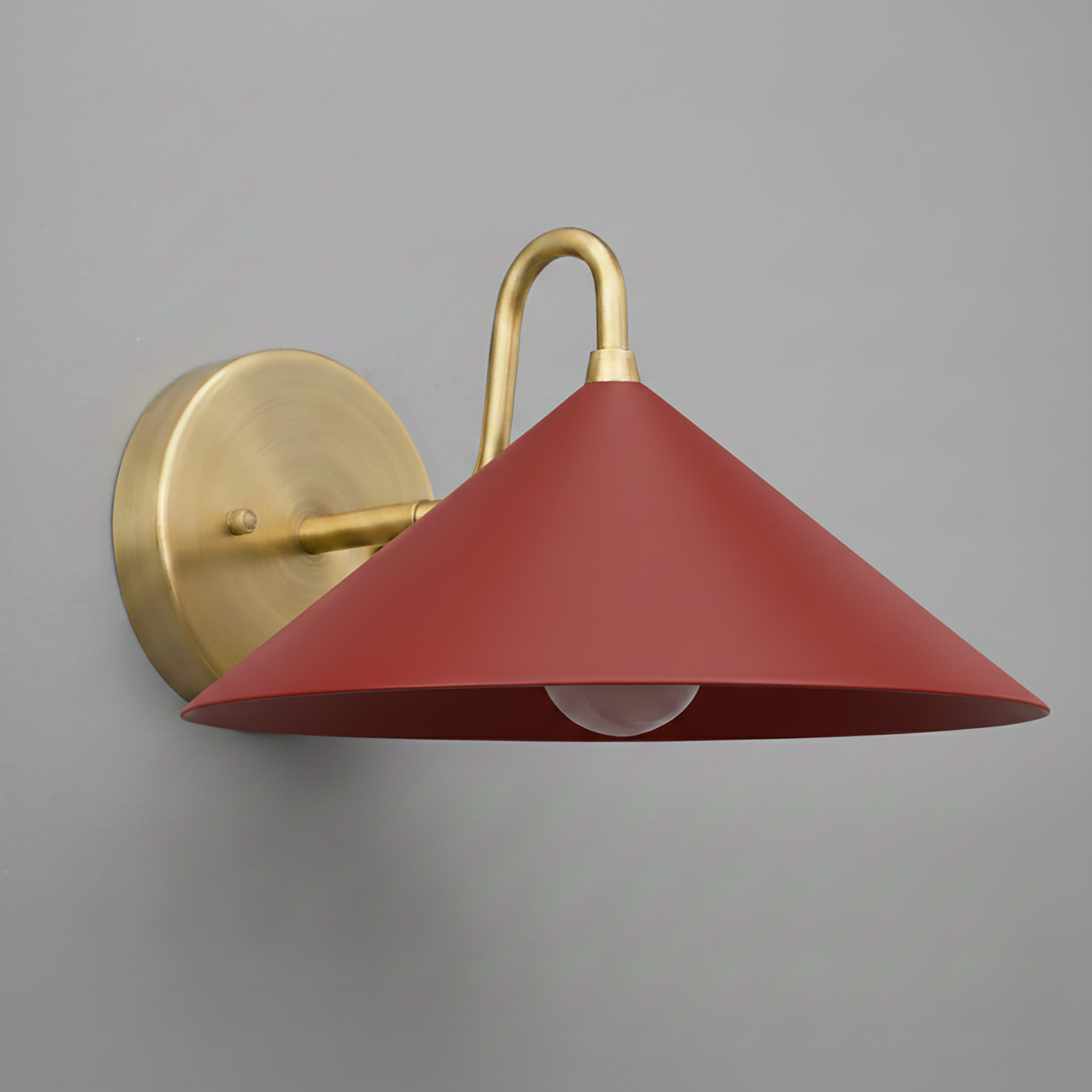Antique brass wall sconce with wide brick red conical shade and exposed bulb. - SCONCE MODEL NO. 6528