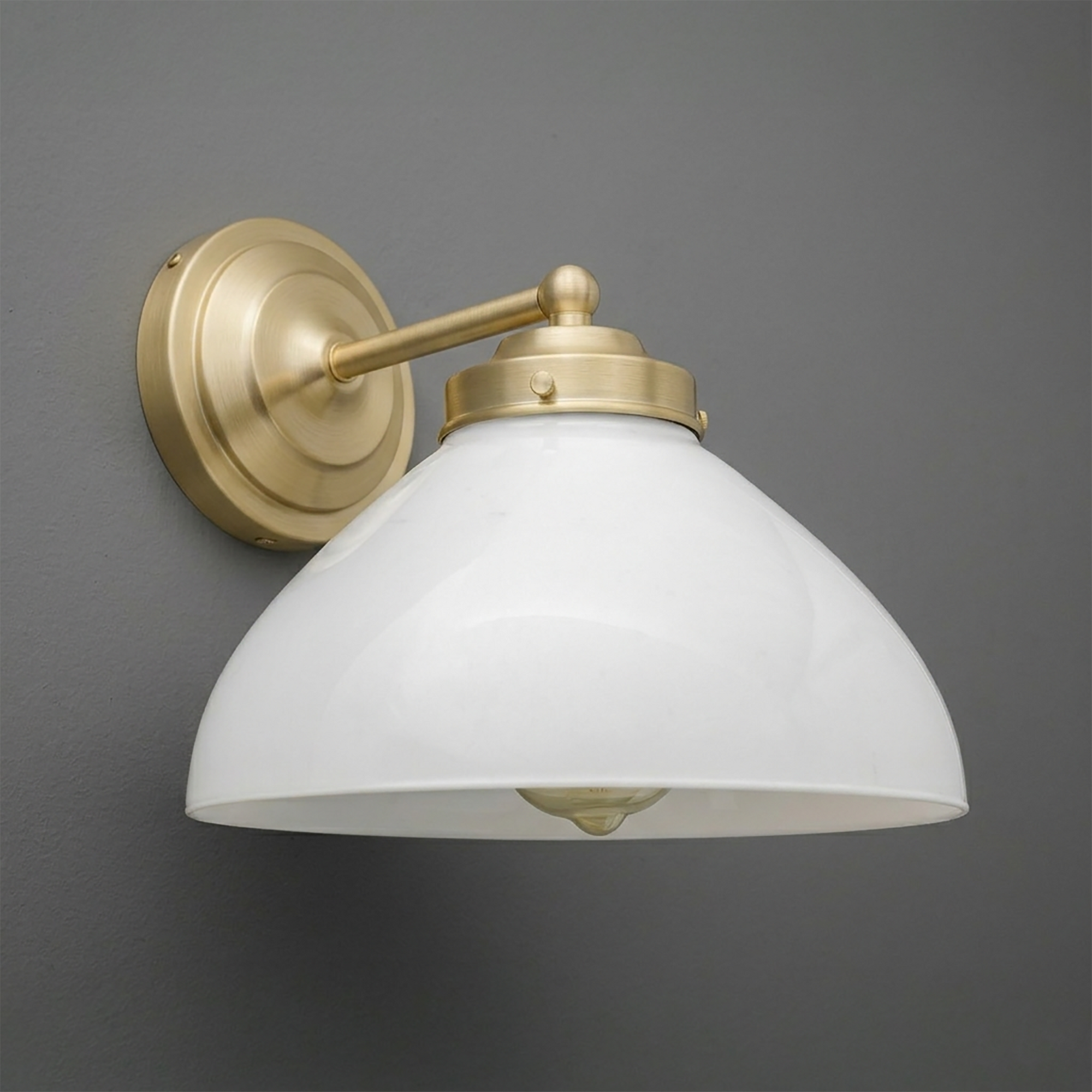 Wall-mounted sconce with matte brass finish and white dome-shaped glass shade. - SCONCE MODEL NO. 9835