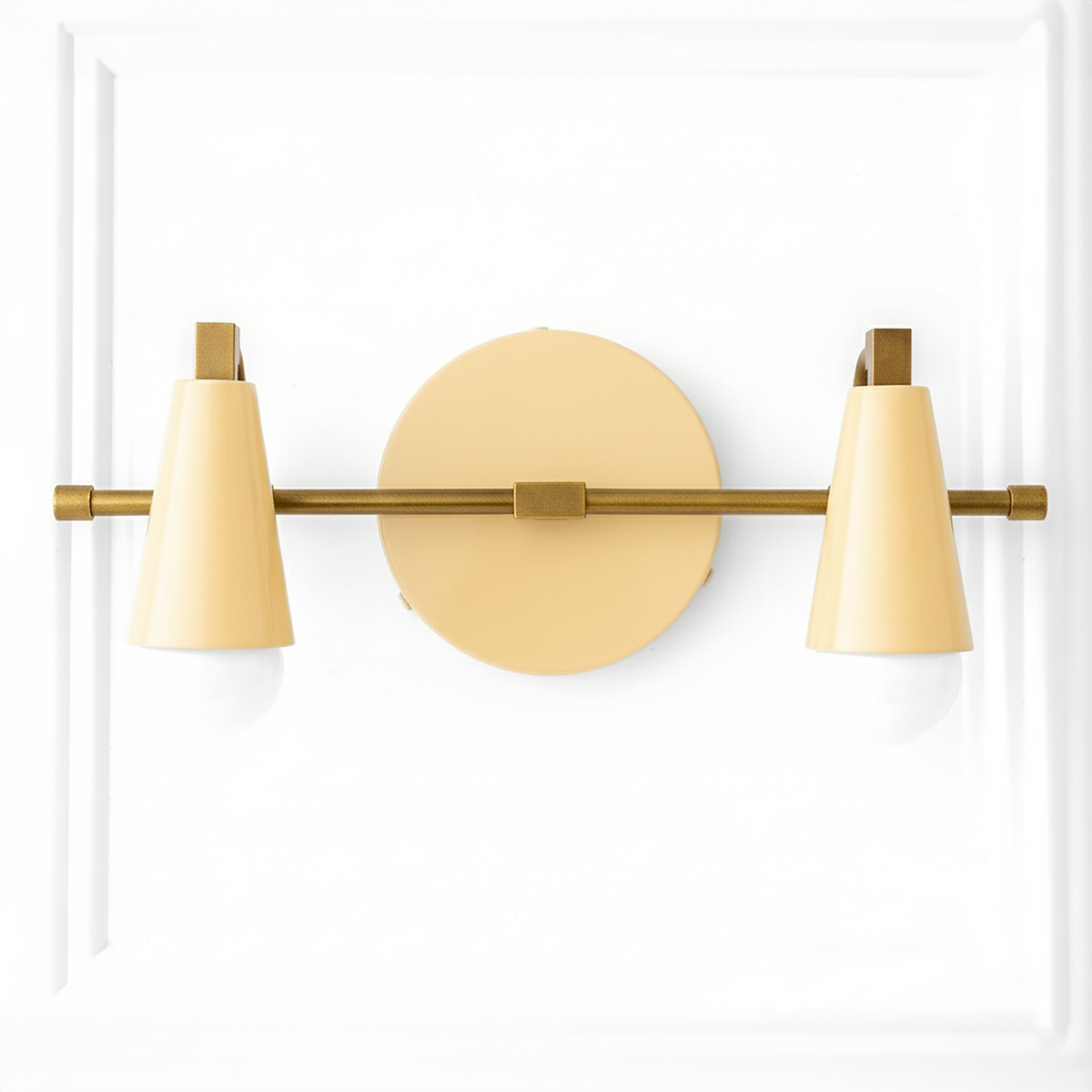 Two-light vanity light with Antique Brass arm and hardware, Yellow cone shades and a matching Yellow round backplate. - VANITY LIGHT MODEL NO. 1229
