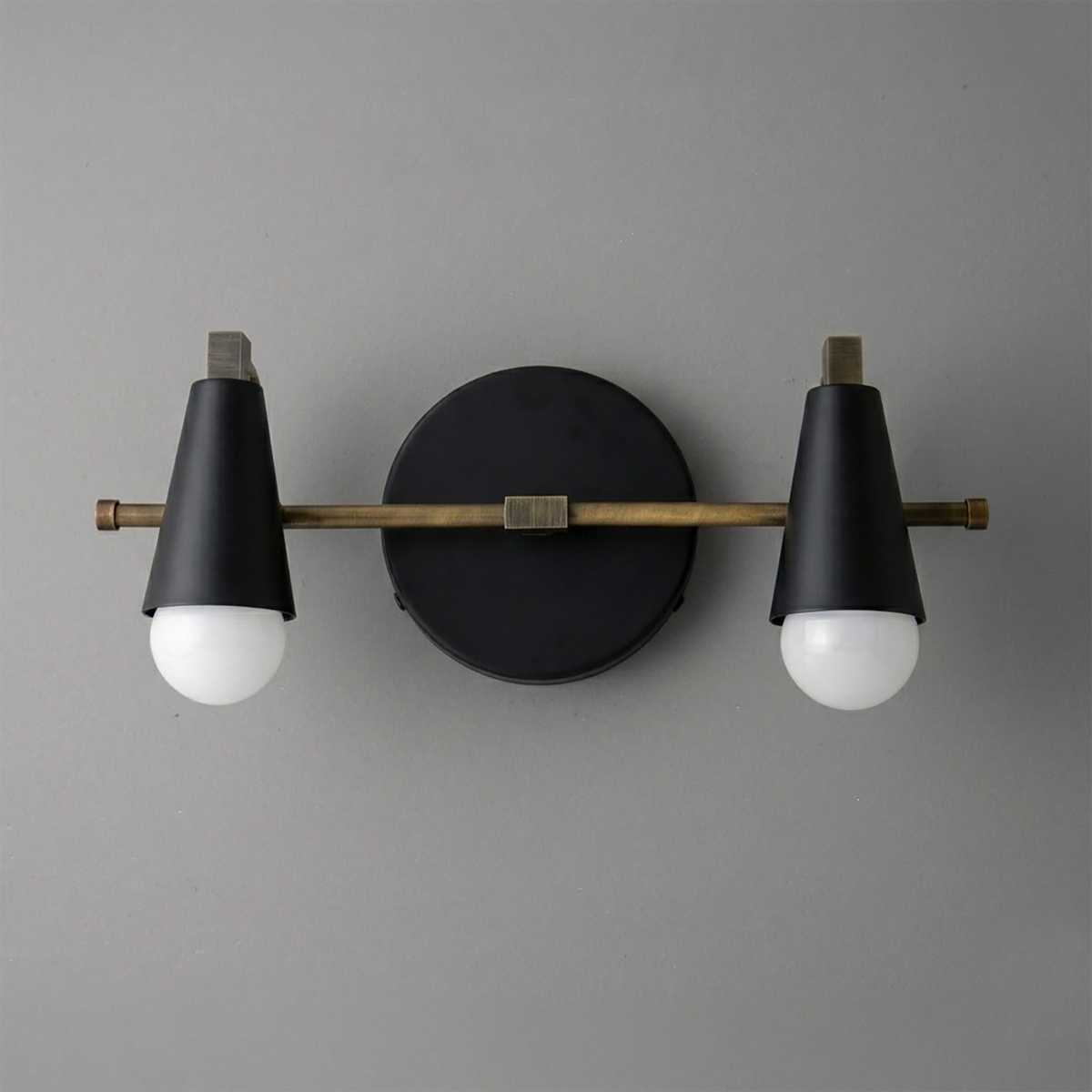 Scandinavian-style 2-bulb vanity light with matte black conical shades and brass horizontal rod. - VANITY LIGHT MODEL NO. 1229
