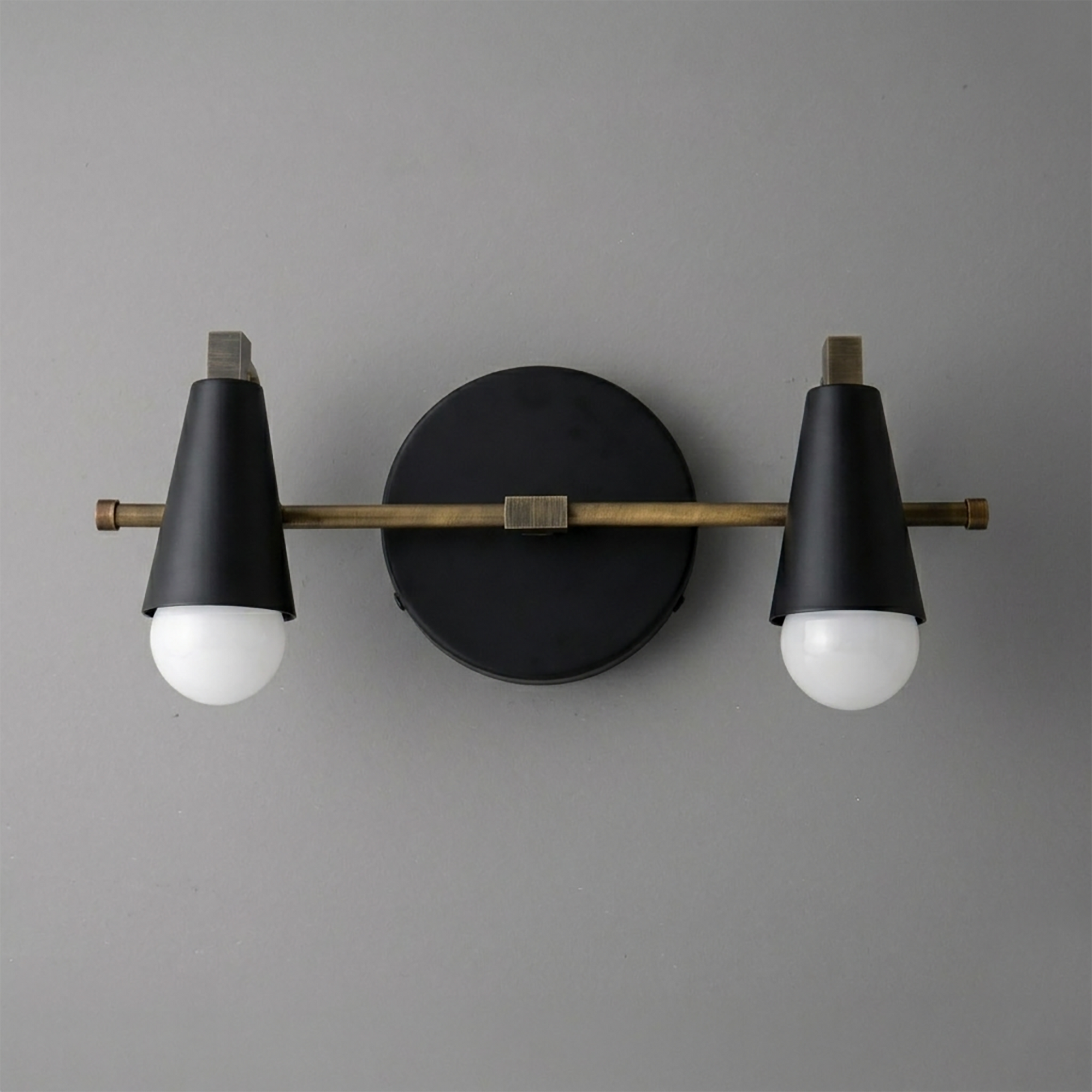 Scandinavian-style 2-bulb vanity light with matte black conical shades and brass horizontal rod. - VANITY LIGHT MODEL NO. 1229