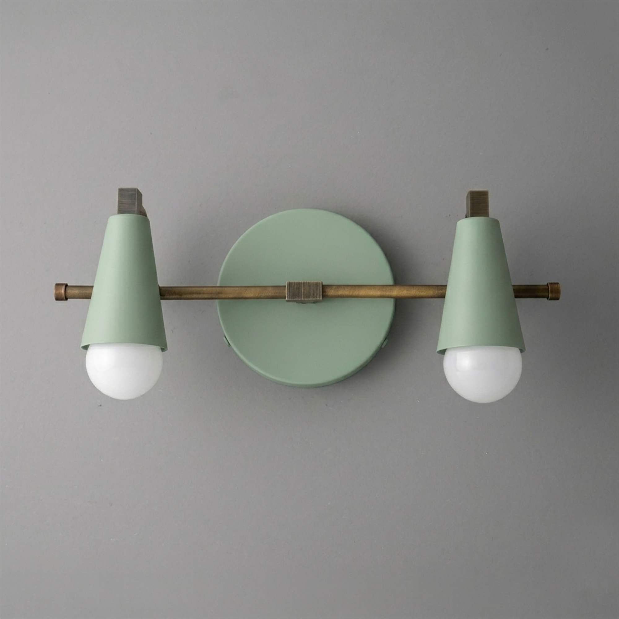 Scandinavian-style vanity light with mint green conical shades and brass horizontal rod mounting two exposed bulbs. - VANITY LIGHT MODEL NO. 1229