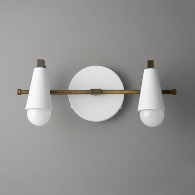 Scandinavian-style vanity light with two white cone-shaped shades and round backplate in matte brass finish. - VANITY LIGHT MODEL NO. 1229