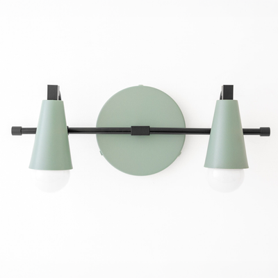 Scandinavian-style vanity light with two exposed bulbs, matte green conical shades, and black metal bar and round wall mount. - VANITY LIGHT MODEL NO. 1229