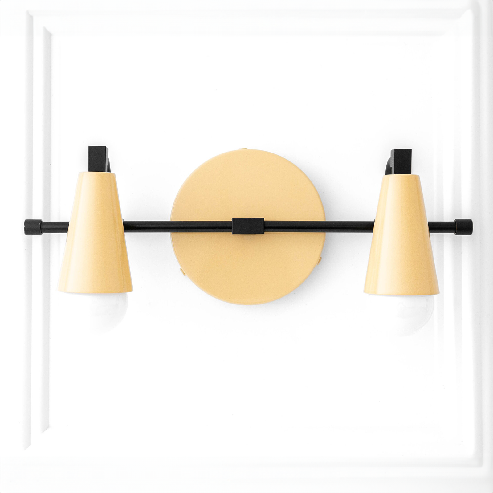 Matte gold metal vanity light with two conical shades on a horizontal black rod and round gold wall plate. - VANITY LIGHT MODEL NO. 1229