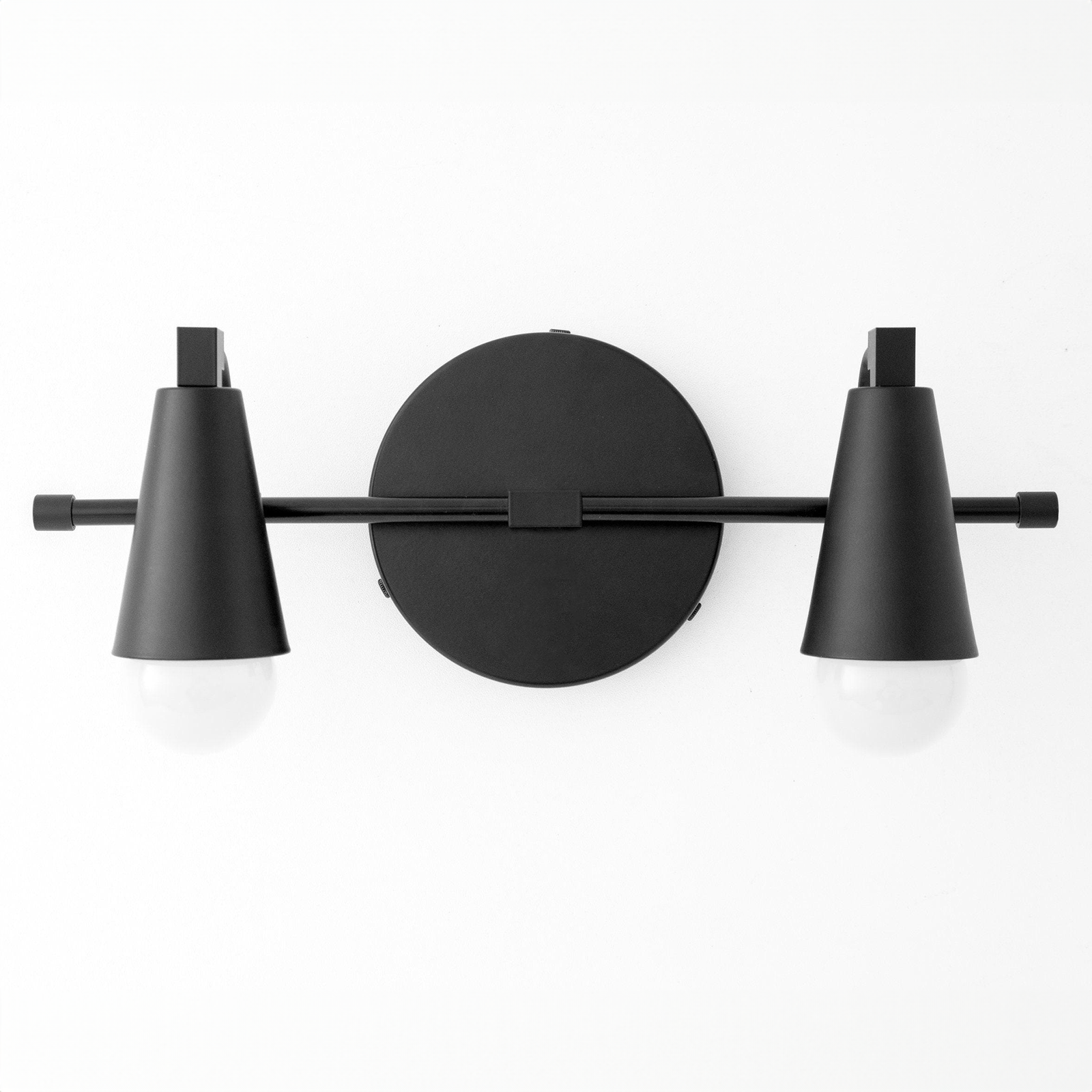 Black metal industrial vanity light with two exposed bulbs and conical shades. - VANITY LIGHT MODEL NO. 1229