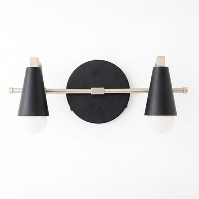 Scandinavian-style 2-bulb vanity light with black conical shades and brushed metal rod mounted on a round black base. - VANITY LIGHT MODEL NO. 1229