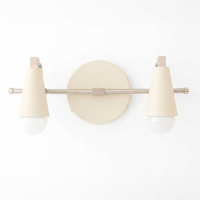 Cream-colored Scandinavian-style vanity light with two conical shades and exposed bulbs on horizontal metal rod. - VANITY LIGHT MODEL NO. 1229