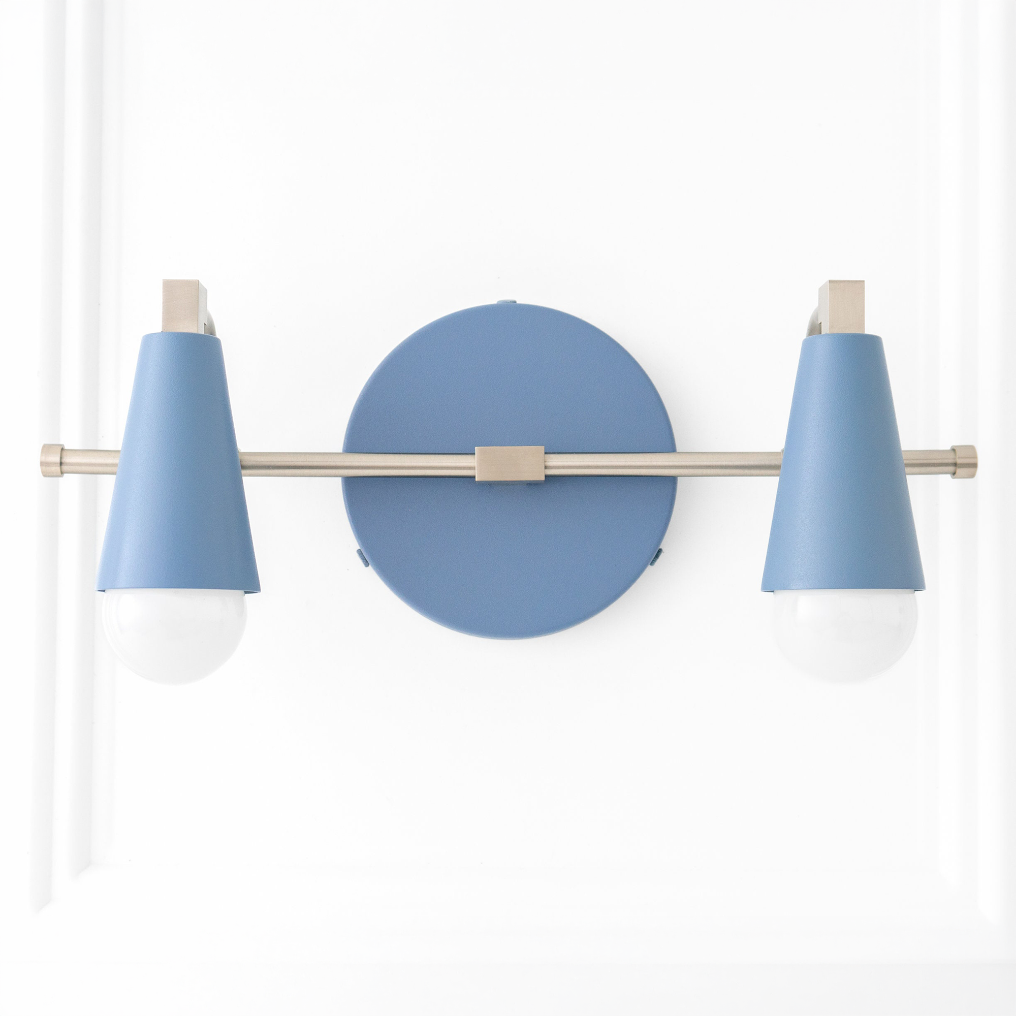Scandinavian-style vanity light with two matte blue conical shades and brushed metal bar mounting on round blue backplate. - VANITY LIGHT MODEL NO. 1229