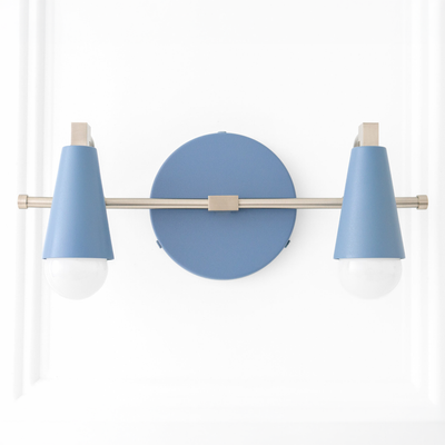 Scandinavian-style vanity light with two matte blue conical shades and brushed metal bar mounting on round blue backplate. - VANITY LIGHT MODEL NO. 1229