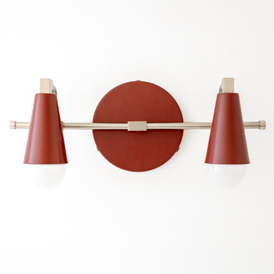 Scandinavian-style 2-bulb vanity light with matte red conical shades and brushed metal accents. - VANITY LIGHT MODEL NO. 1229