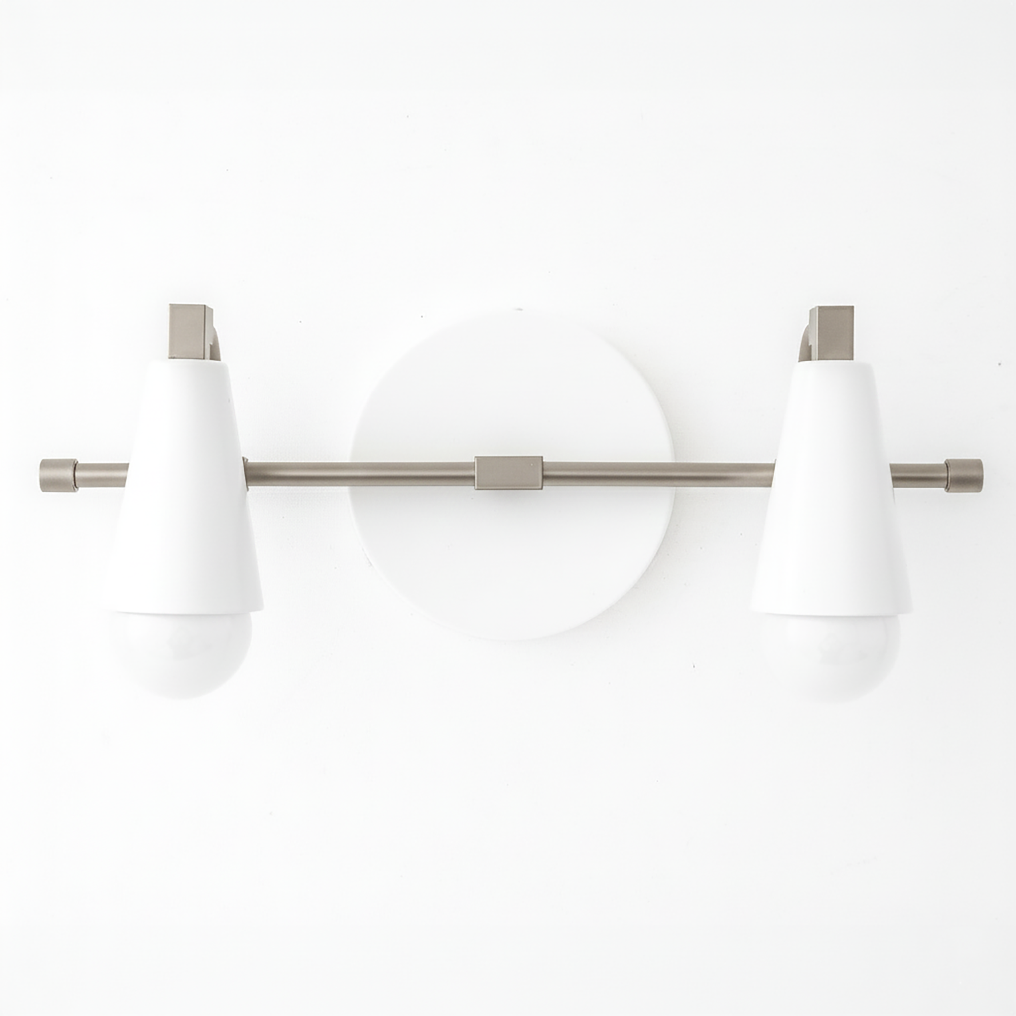 Two-bulb vanity light with matte white conical shades and brushed nickel horizontal bar and round wall mount. - VANITY LIGHT MODEL NO. 1229