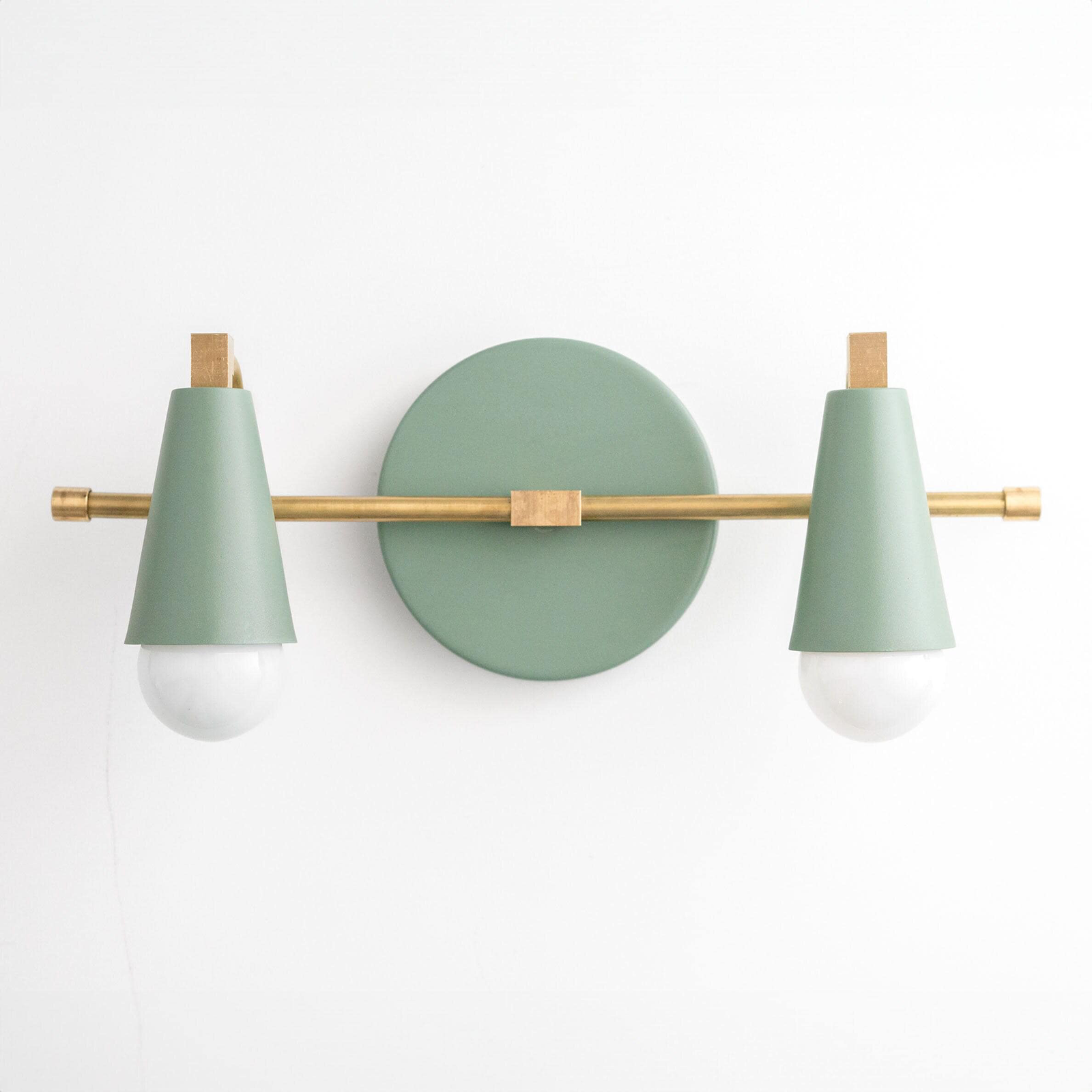 Industrial-style vanity light with matte green conical shades and brass horizontal rod mount. - VANITY LIGHT MODEL NO. 1229