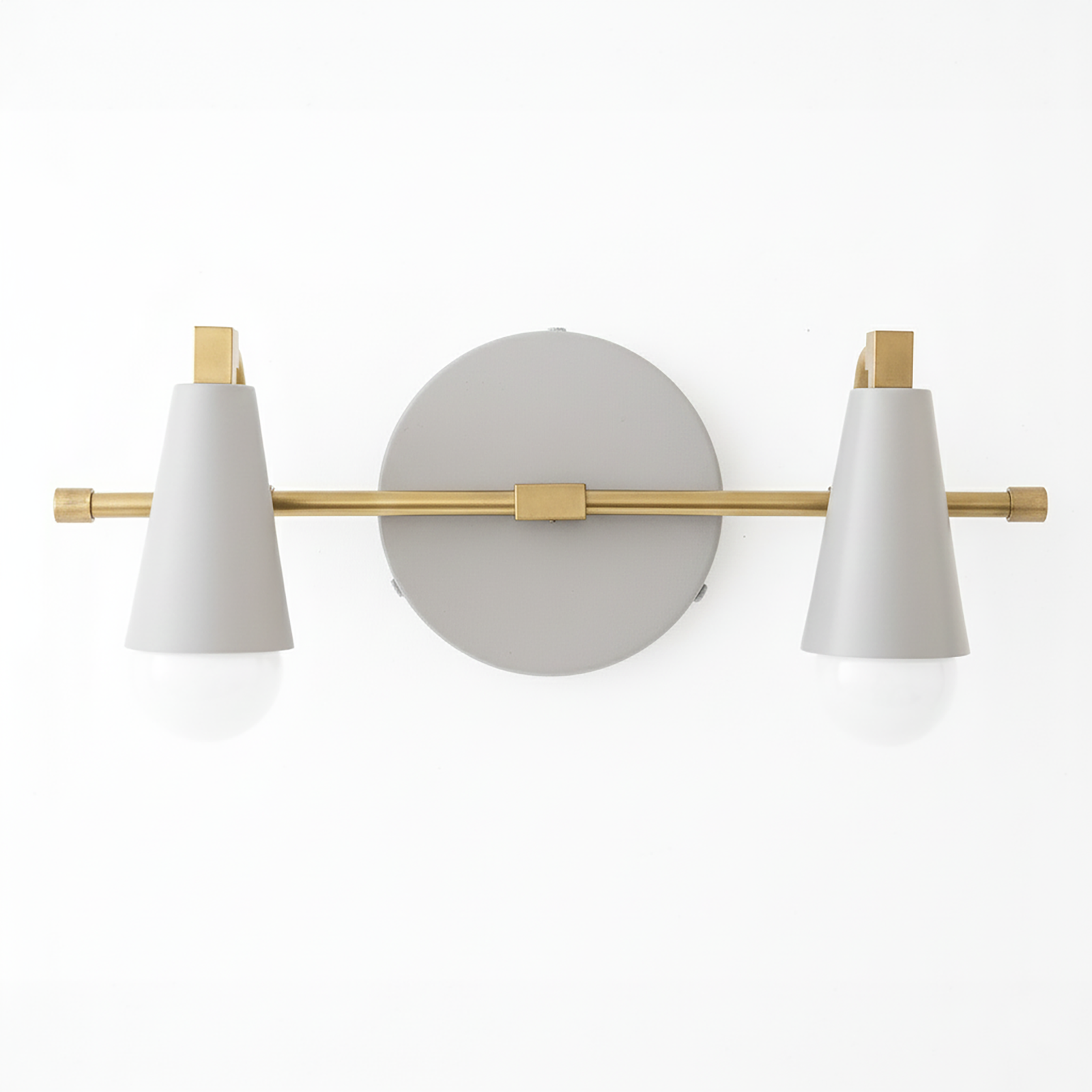 Modern vanity light with matte white conical shades, brass horizontal rod, and round wall mount. - VANITY LIGHT MODEL NO. 1229