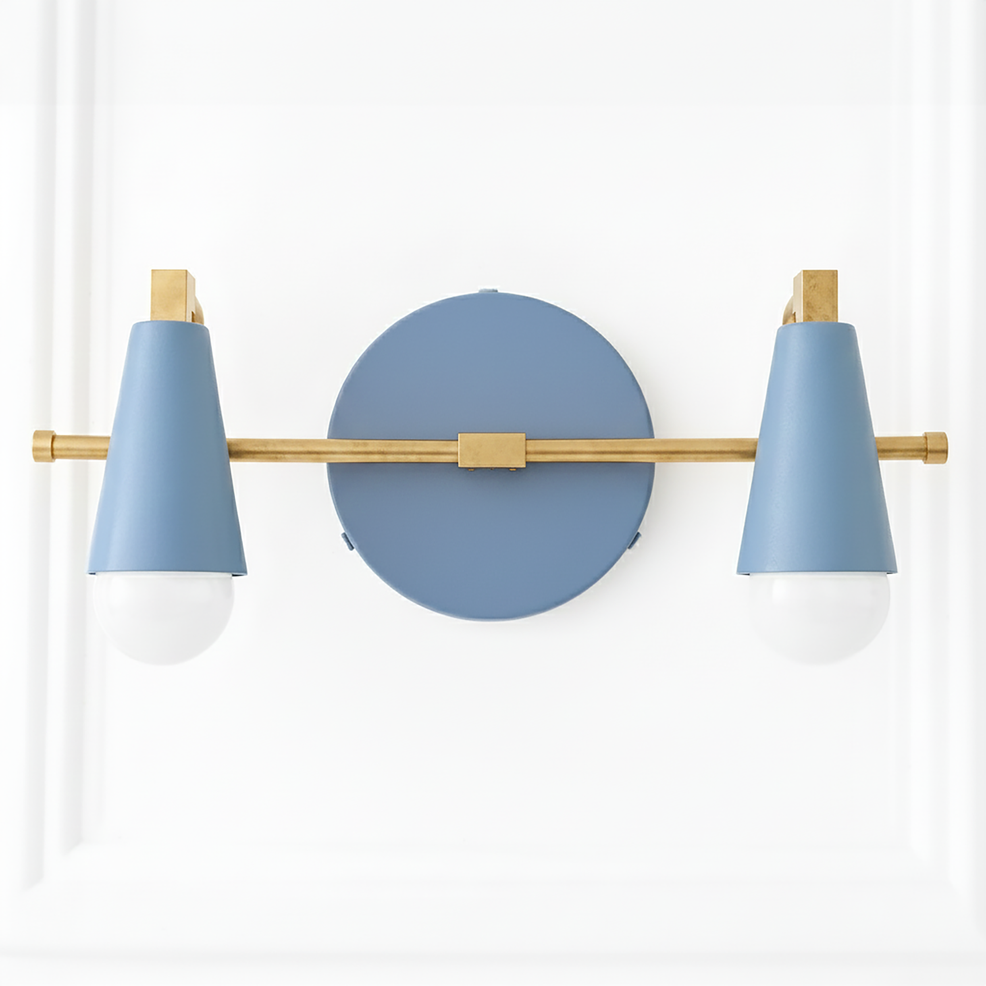 Two-light vanity fixture with matte blue cone shades and brass horizontal bar on a round blue wall plate. - VANITY LIGHT MODEL NO. 1229