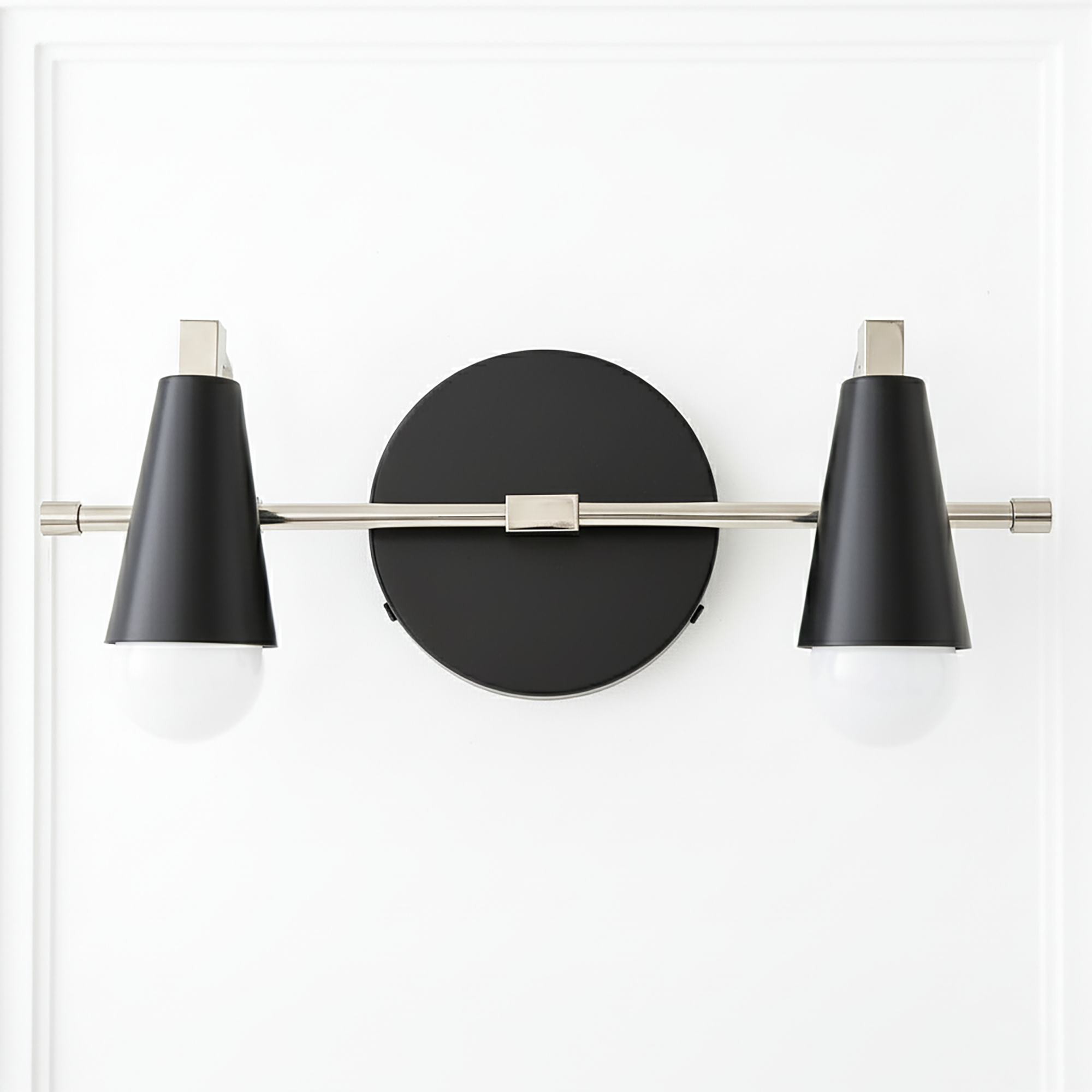 Industrial-style black metal vanity light with two conical shades and a nickel-finished horizontal bar. - VANITY LIGHT MODEL NO. 1229